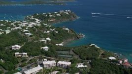 4.8K aerial stock footage of Oceanfront homes on sapphire blue waters, East End, St Thomas  Aerial Stock Footage | AX102_246