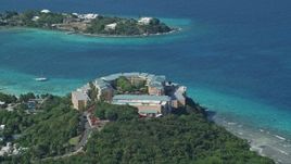 4.8K aerial stock footage of Sugar Bay Resort and Spa along turquoise blue waters, St Thomas Aerial Stock Footage | AX102_258