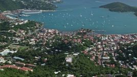 4.8K aerial stock footage of a Coastal town along turquoise blue Caribbean waters, Charlotte Amalie, St Thomas  Aerial Stock Footage | AX102_293