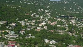 4.8K aerial stock footage of Upscale hillside homes among trees, Charlotte Amalie, St Thomas Aerial Stock Footage | AX103_003