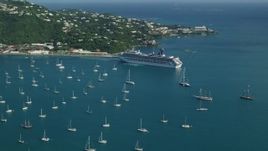 4.8K aerial stock footage of a Cruise ship and sailboats in turquoise blue Caribbean waters, Charlotte Amalie, St Thomas Aerial Stock Footage | AX103_005