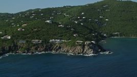 4.8K aerial stock footage of Hillside mansions overlooking Caribbean blue waters, Cruz Bay, St John Aerial Stock Footage | AX103_037