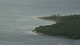 4.8K aerial stock footage of Caribbean beach along turquoise blue waters, Rada Fajardo, Puerto Rico Aerial Stock Footage | AX103_115