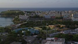 4.8K aerial stock footage of La Fortaleza and Caribbean buildings, Old San Juan sunset Aerial Stock Footage | AX104_035