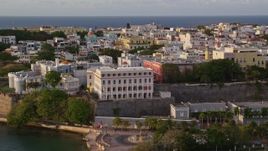 4.8K aerial stock footage of La Fortaleza and Caribbean buildings, Old San Juan sunset Aerial Stock Footage | AX104_036E