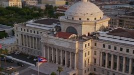 4.8K aerial stock footage of oceanfront San Juan Capitol Building, Old San Juan Puerto Rico, sunset Aerial Stock Footage | AX104_046E