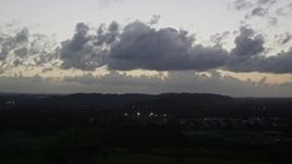 4.8K aerial stock footage of clouds over the Caribbean town of Dorado, Puerto Rico, twilight Aerial Stock Footage | AX104_138