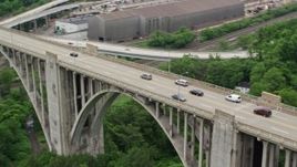 4.8K aerial stock footage approach George Westinghouse Bridge and track traffic crossing it, East East Pittsburgh, Pennsylvania Aerial Stock Footage | AX105_060E