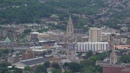4.8K aerial stock footage of a church with steeple by apartments, Pittsburgh, Pennsylvania Aerial Stock Footage | AX105_082