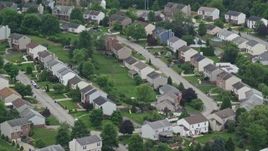 4.8K aerial stock footage passing a suburban neighborhood, Penn Hills, Pennsylvania Aerial Stock Footage | AX105_094E