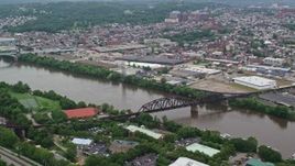 4.8K aerial stock footage of bridges over Allegheny River, Pittsburgh, Pennsylvania Aerial Stock Footage | AX105_142E
