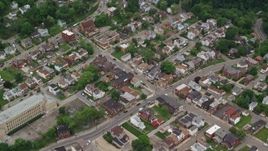 4.8K aerial stock footage tilting to a bird's eye view of a residential neighborhood, Pittsburgh, Pennsylvania Aerial Stock Footage | AX105_189E