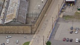 4.8K aerial stock footage orbiting a guard tower at Western State Penitentiary, Pittsburgh, Pennsylvania Aerial Stock Footage | AX105_217