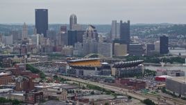 4.8K aerial stock footage of Heinz Field Football Stadium and Downtown Pittsburgh Skyline, Pennsylvania Aerial Stock Footage | AX105_225E
