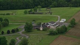 4.8K aerial stock footage orbiting a rural church in Beaver Falls, Pennsylvania Aerial Stock Footage | AX106_043