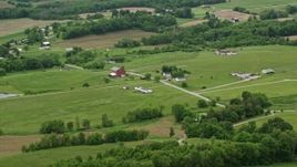 4.8K aerial stock footage of red barns and farmhouses in Enon Valley, Pennsylvania Aerial Stock Footage | AX106_057E