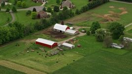 4.8K aerial stock footage approaching red barns in Enon Valley, Pennsylvania Aerial Stock Footage | AX106_063E