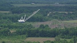 4.8K aerial stock footage of a tall crane by a forest in Enon Valley, Pennsylvania Aerial Stock Footage | AX106_065