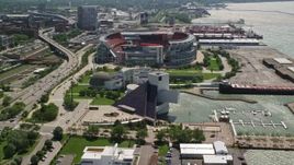 4.8K aerial stock footage of the Rock and Roll Hall of Fame in Downtown Cleveland, Ohio Aerial Stock Footage | AX106_227E