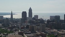 4.8K aerial stock footage flying by then approaching Downtown Cleveland skyscrapers, Ohio Aerial Stock Footage | AX107_006E