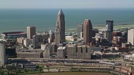 4.8K aerial stock footage of Downtown Cleveland skyscrapers and industrial buildings, Ohio Aerial Stock Footage | AX107_030E