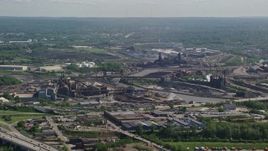 4.8K aerial stock footage of factories along a river, Cleveland, Ohio Aerial Stock Footage | AX107_047