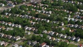 4.8K aerial stock footage of suburban homes and trees, Cleveland, Ohio Aerial Stock Footage | AX107_053