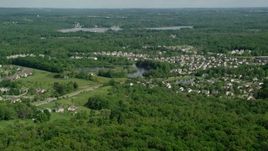 4.8K aerial stock footage approaching a lakeside suburban neighborhood, Aurora, Ohio Aerial Stock Footage | AX107_067