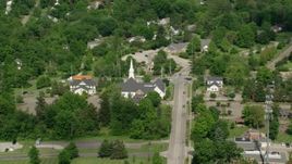 4.8K aerial stock footage orbiting a church along a busy road, Aurora, Ohio Aerial Stock Footage | AX107_074