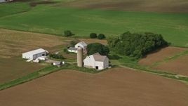 4.8K aerial stock footage of a farmhouse and barns, Newton Falls, Ohio Aerial Stock Footage | AX107_096E