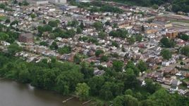 4.8K aerial stock footage of a suburban community near the river, Ohio River, Monaca, Pennsylvania Aerial Stock Footage | AX107_136