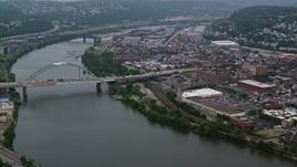 4.8K aerial stock footage of Birmingham Bridge, Monongahela River, and an urban Pittsburgh neighborhood, Pennsylvania Aerial Stock Footage | AX107_177E