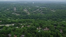 4.8K aerial stock footage of suburban neighborhoods and forests, Penn Hills, Pennsylvania Aerial Stock Footage | AX107_205