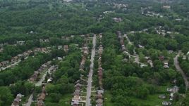 4.8K aerial stock footage of suburban neighborhoods and trees, Penn Hills, Pennsylvania Aerial Stock Footage | AX107_209