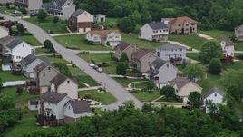 4.8K aerial stock footage approaching a residential neighborhood, Penn Hills, Pennsylvania Aerial Stock Footage | AX107_212E