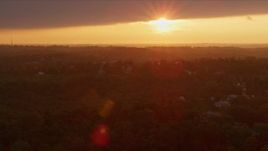4K aerial stock footage flying by residential neighborhood, Penn Hills, Pennsylvania, sunset Aerial Stock Footage | AX108_001