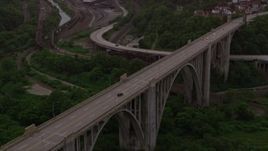 4K aerial stock footage of George Westinghouse Bridge among trees, Pittsburgh, Pennsylvania Aerial Stock Footage | AX108_012E