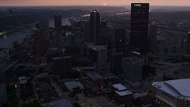 4K aerial stock footage flyby downtown skyscrapers, then approach BNY Mellon Center, Downtown Pittsburgh, twilight Aerial Stock Footage | AX108_080E