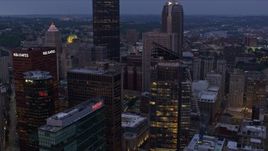 4K aerial stock footage flying over skyscrapers, Downtown Pittsburgh, Pennsylvania, twilight Aerial Stock Footage | AX108_100E
