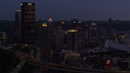 4K aerial stock footage skyscrapers in Downtown Pittsburgh, Pennsylvania, twilight Aerial Stock Footage | AX108_137E