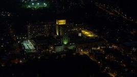 4K aerial stock footage orbiting Allegheny General Hospital, Pittsburgh, night Aerial Stock Footage | AX108_214