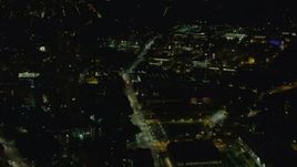 4K aerial stock footage approaching Carnegie Mellon University, Pittsburgh, Pennsylvania, night Aerial Stock Footage | AX108_244