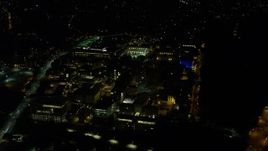 4K aerial stock footage approaching Carnegie Mellon University, Pittsburgh, Pennsylvania, night Aerial Stock Footage | AX108_245