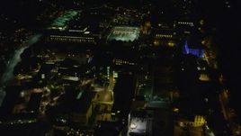 4K aerial stock footage tilting down on the Carnegie Mellon University campus, Pittsburgh, Pennsylvania, night Aerial Stock Footage | AX108_246