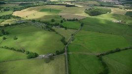 5.5K aerial stock footage fly over farms and farmland; Stirling, Scotland Aerial Stock Footage | AX109_010E