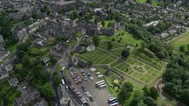 5.5K aerial stock footage of a church and cemetery near residential area, Stirling, Scotland Aerial Stock Footage | AX109_026E