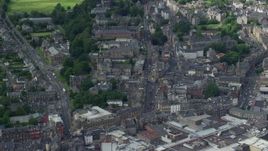 5.5K aerial stock footage of panning across apartment buildings in Stirling, Scotland Aerial Stock Footage | AX109_030