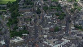 5.5K aerial stock footage fly over residential buildings along King Street, church and Stirling Castle in Stirling, Scotland Aerial Stock Footage | AX109_031E