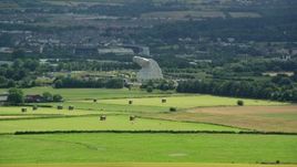 5.5K aerial stock footage approach The Kelpies sculptures from farmland, Falkirk Scotland Aerial Stock Footage | AX109_117