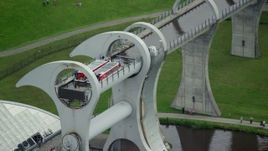 5.5K aerial stock footage flyby ferries on the Falkirk Wheel boat lift, Scotland Aerial Stock Footage | AX109_142E